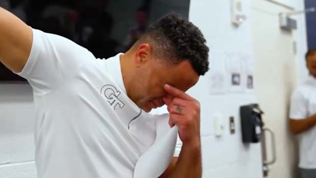 Georgia Tech men’s basketball coach Damon Stoudamire tearfully addresses his team after upsetting No. 3 North Carolina on Jan. 30, 2024.